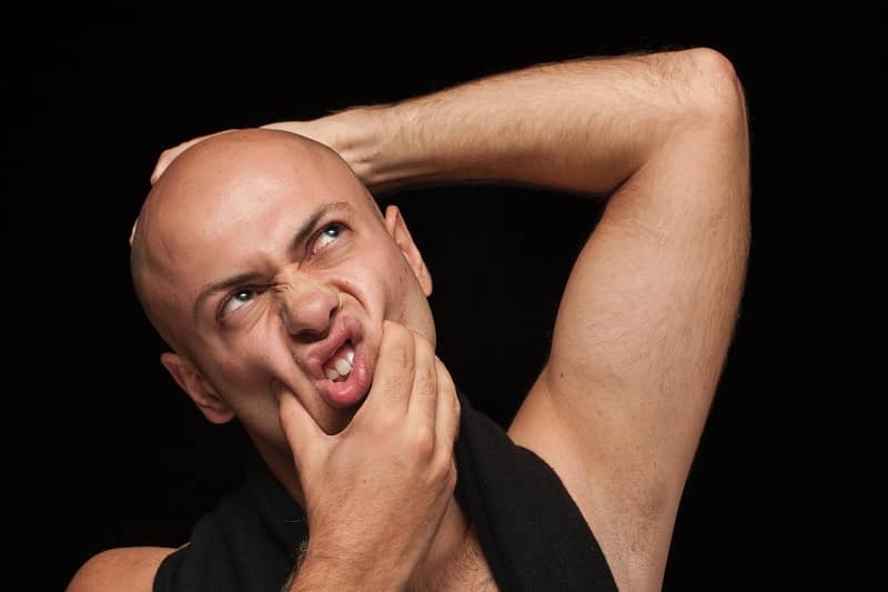 What is the cause of hair loss in males